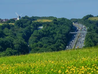 A UK motorway surrounded by countryside. 