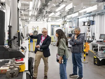 A student exploring a university facility at an open day.