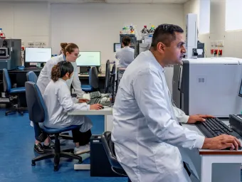 Researchers at computers