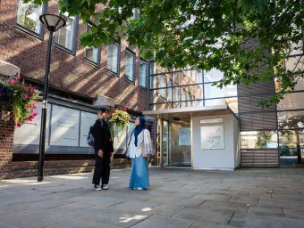 Students outside student hub
