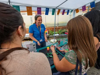 Visitors take part in a hands-on materials science activity at the Future Chemistry Hub, exploring seaweed-derived polymers and creating colourful gel-like materials with guidance from University of Southampton outreach staff.