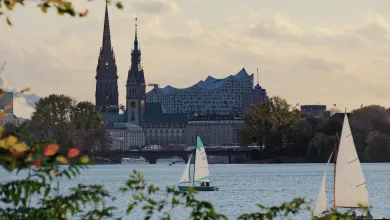A cloudy sunset in Hamburg, looking across the river to the cathedral.