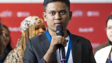 International student Karthik Saravan presenting at a conference