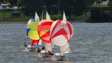 3 sailing boats with spinnakers in a line