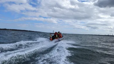 Powerboat speeding away from the camera