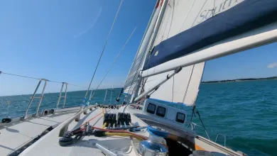 Looking out over the bow of a yacht at sea
