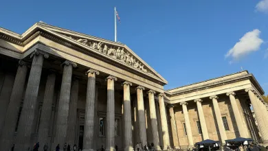 The front of the British Museum on a sunny day. 