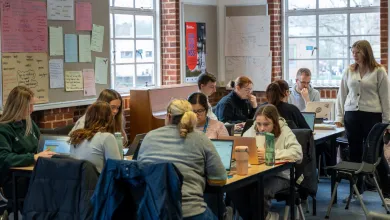 PGCE students working on tablets in a university based discussion session.