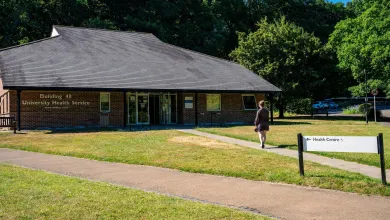 The University of Southampton's health service centre, also known as Building 48. There is a student walking down the path towards the entrance.