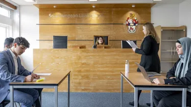 Law students practising in the Moot court room.
