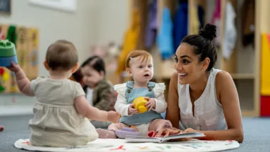 Early Years Centre worker with children