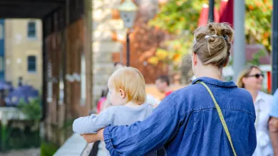 Mother walking with child