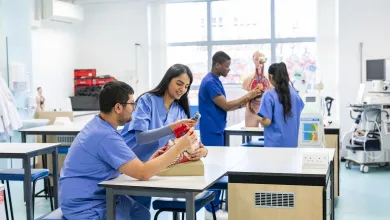 Medicine students in clinical facility