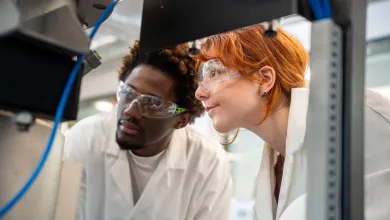 MEng Chemical Engineering students looking at equipment