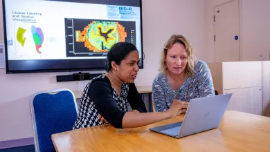 Two female doctors work together on a project
