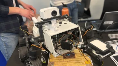 A replica mars rover on a table
