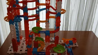 A front view of a colourful marble run on a table
