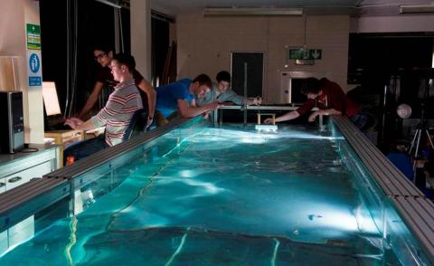 Researchers using a large scale wave tank