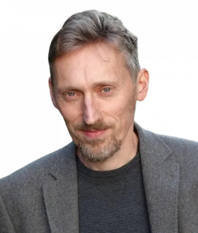 Head and shoulders photo of Professor Chris Armstrong, on a clear background