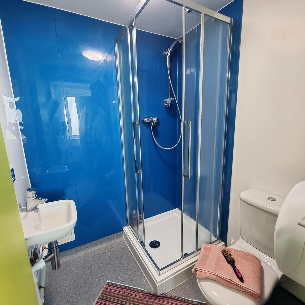 Enhanced plus shared bathroom with wash basin