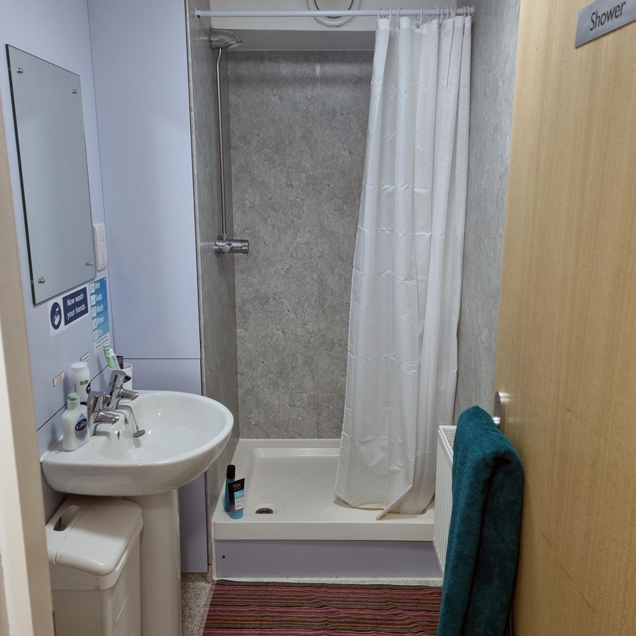 Standard shared bathroom with wash basin