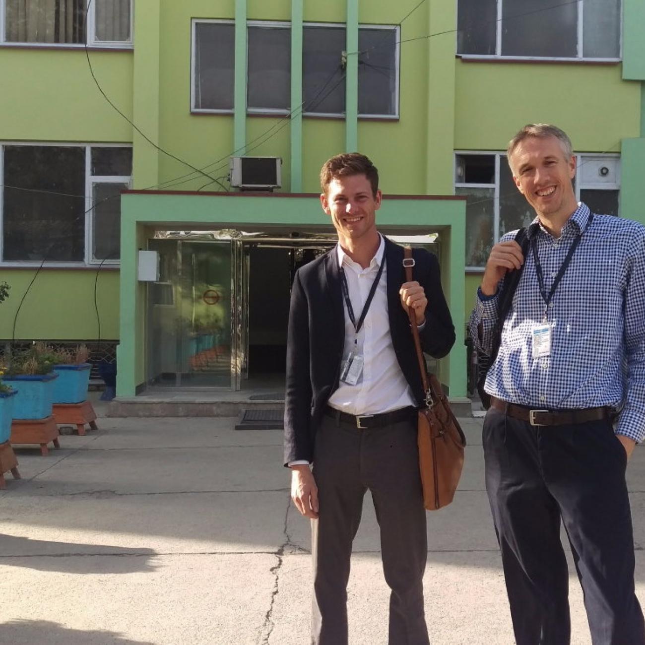 Professor Andrew Tatem standing alongside Linus Bengtsson, the director of Flowminder, outside the Central Statistics Office in Kabul.