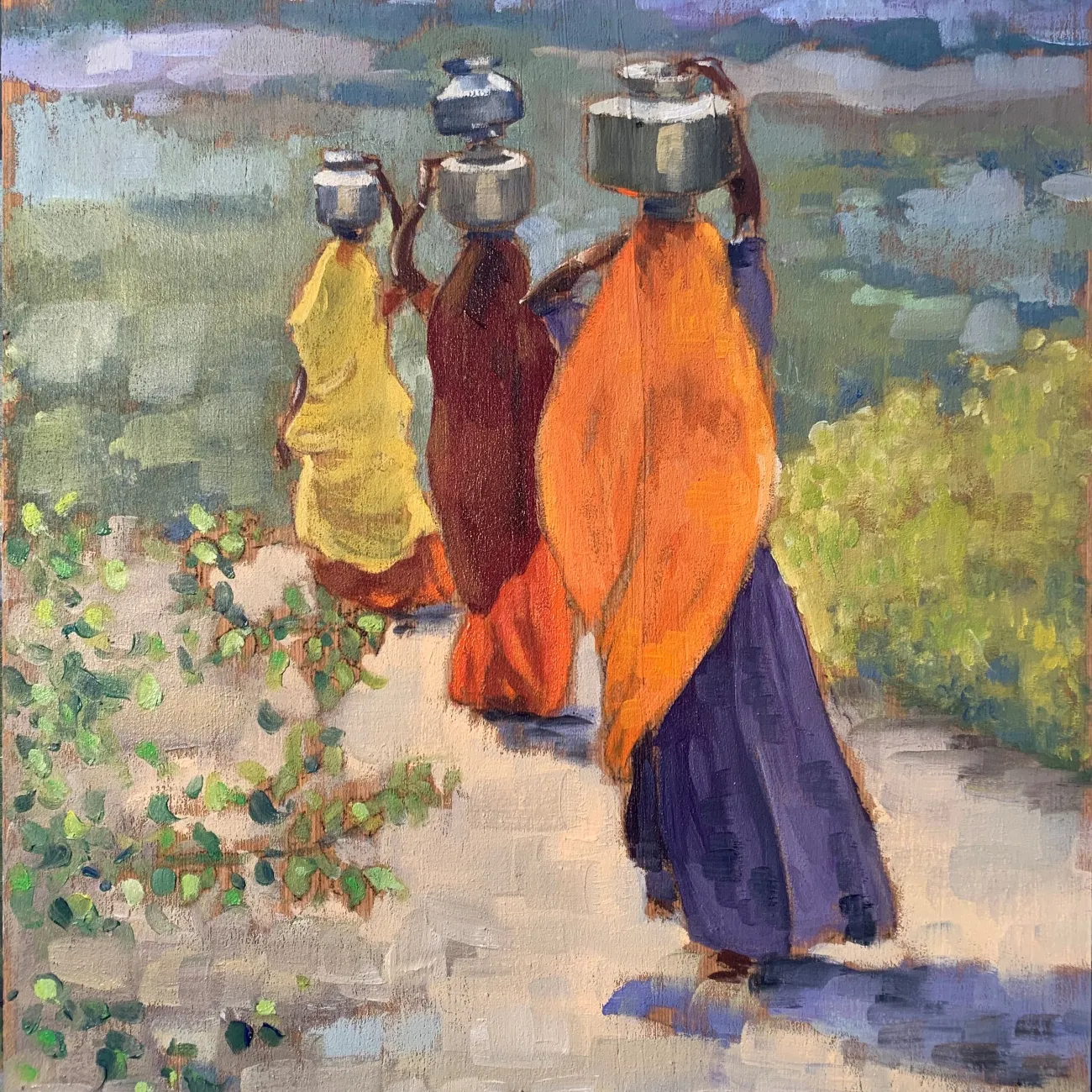 One of Liza's paintings depicting three figues in brightly coloured clothes , carrying pots on their heads and walking away from the viewer on a dusty road surrounded by greenery