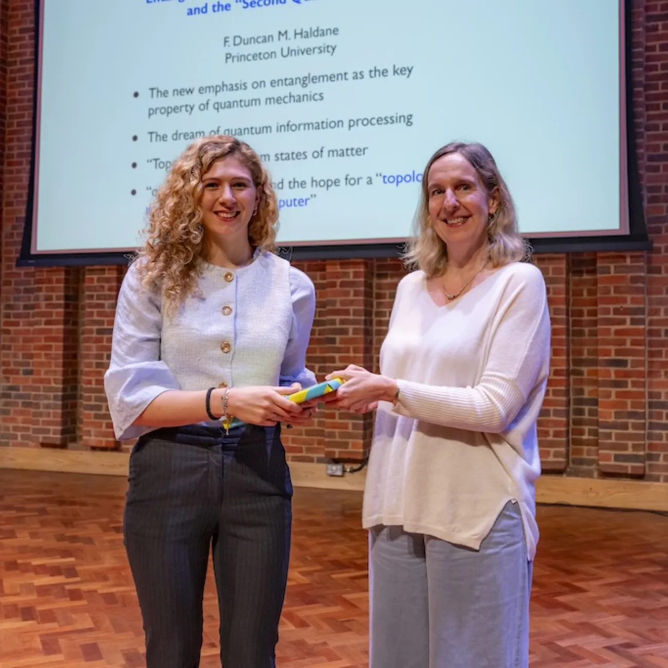 Martina Fusi being presented with prize