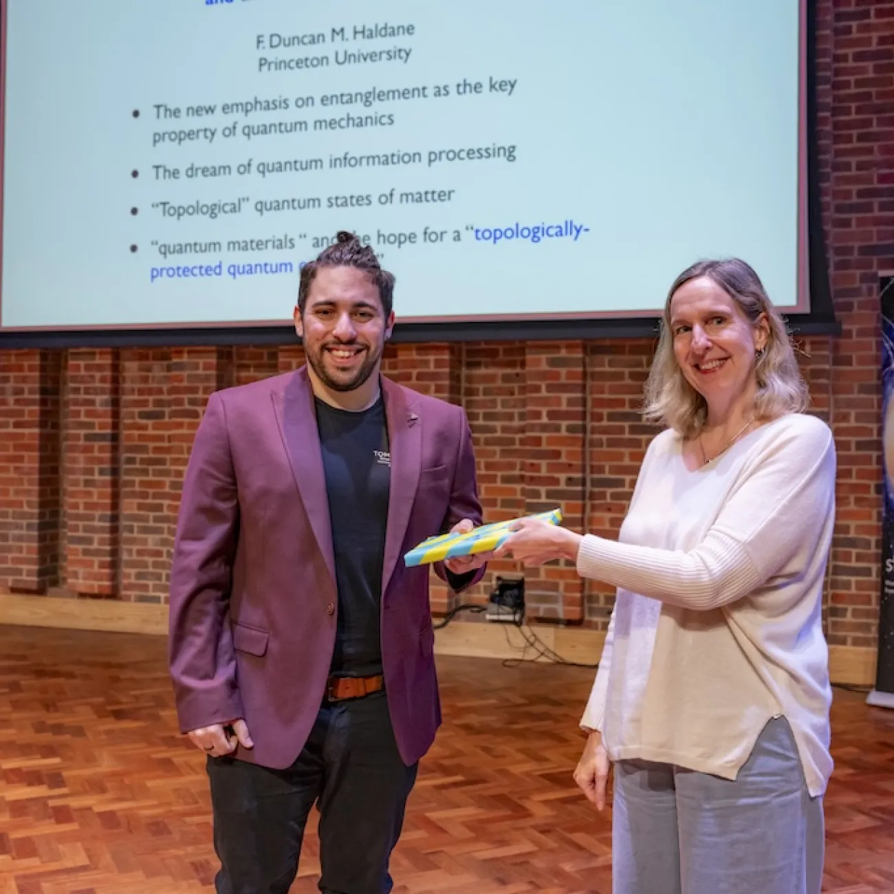 Orestis Papadopoulos being presented with prize