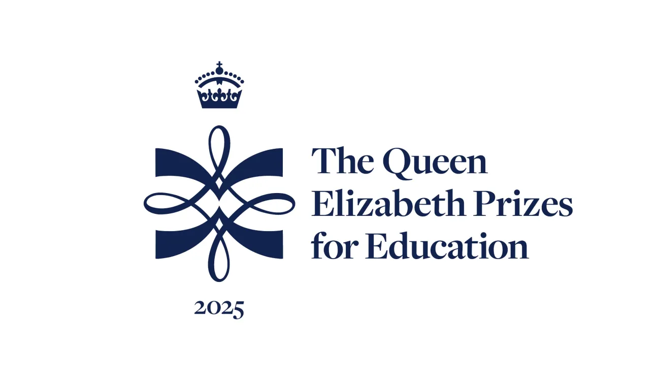 Logo for The Queen Elizabeth Prizes for Education 2025, featuring a blue crown above a symmetrical ribbon-style emblem and the words “The Queen Elizabeth Prizes for Education