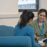 Adviser and student in conversation. 