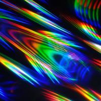 Holographic patterns of light against a black background