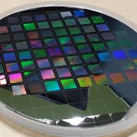 Silicon metasurface for enhanced on-chip spectroscopy 