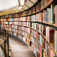 Rows of books on shelves in a library