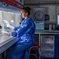 Two people work in a lab