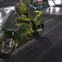 A figure of a motorcyclist inside wind tunnel
