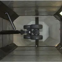 Overhead view of aircraft landing gear mounted inside a test chamber